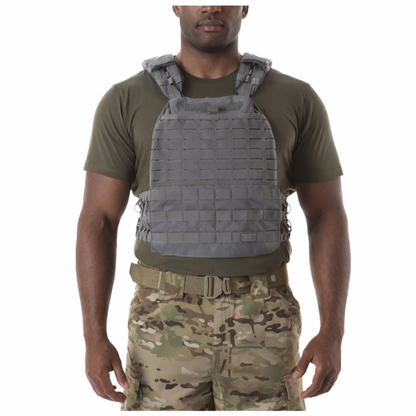 storm color tactical plate carrier front view with adjustable straps and molle system