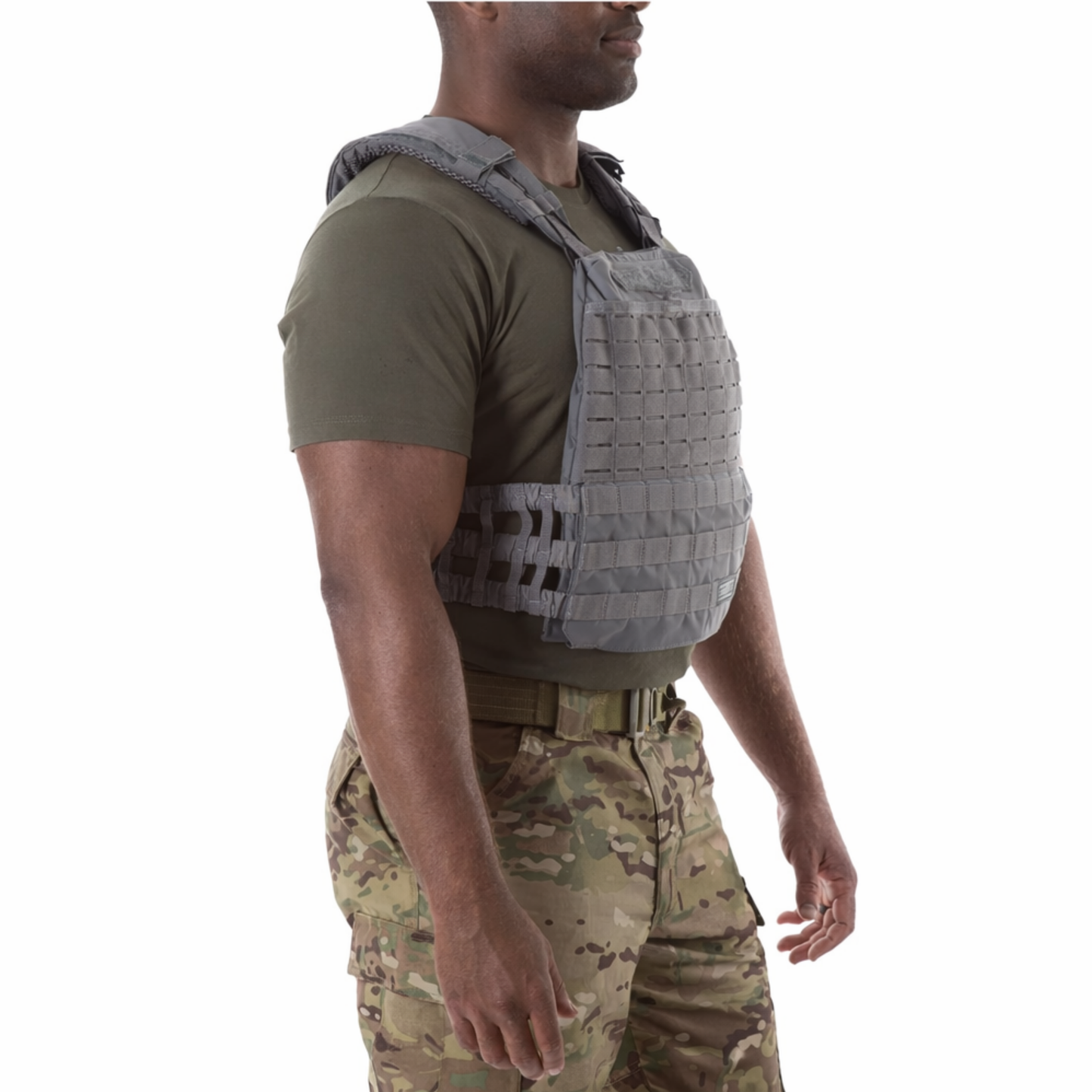 storm color tactical plate carrier side view showing ergonomic fit and modular molle panels